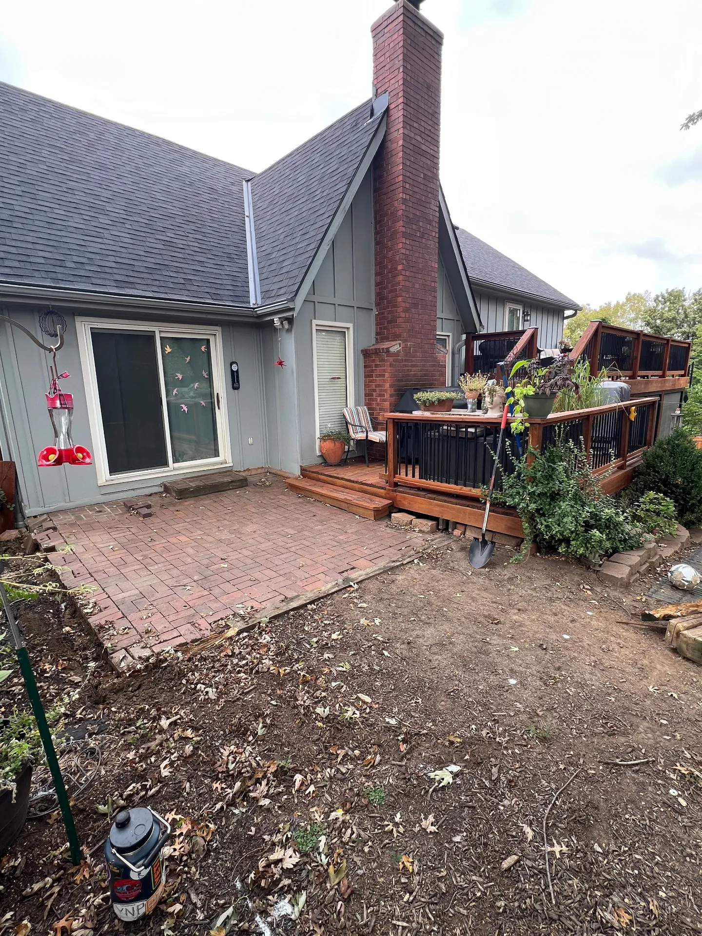 Before paver patio installation - bare dirt and construction area
