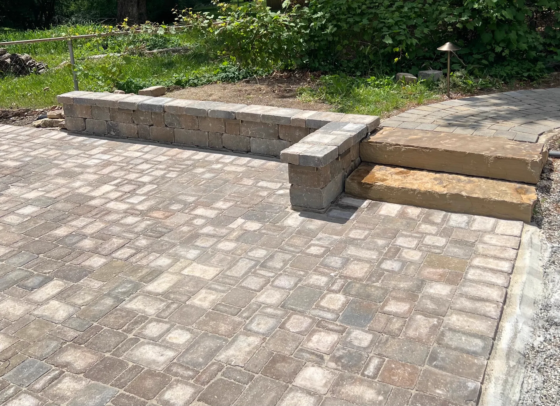 Stone Retaining Wall with Paver Patio